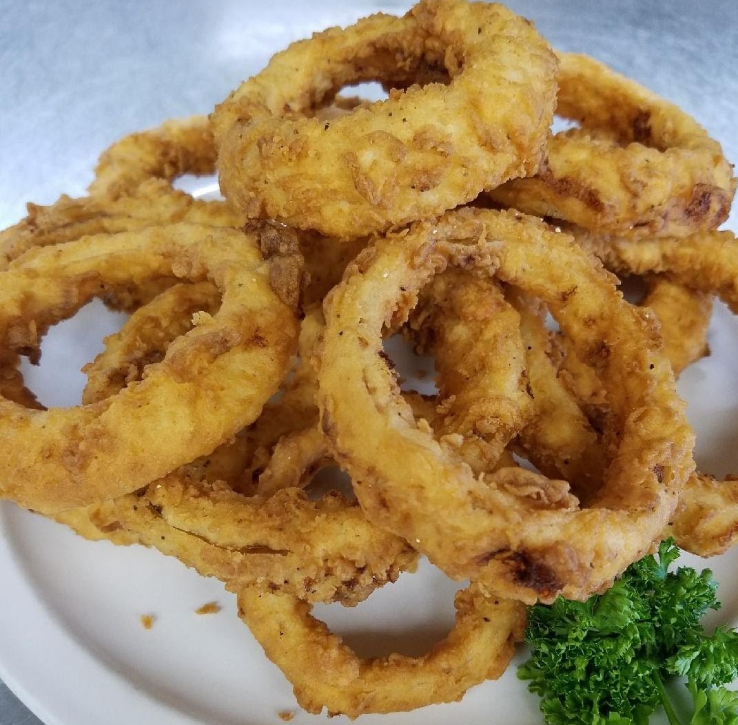 HAND BREADED ONION RINGS Appetizers Steer Inn Restaurant